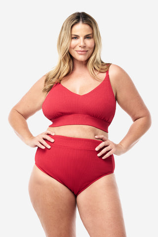 Model wears an XL. She is a size 16, wears a 16DD bra and 181cm tall.
