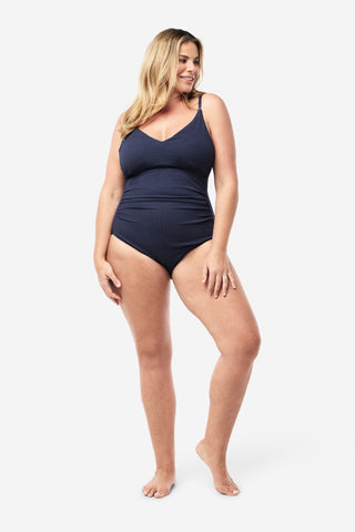 Model wears an XL. She is a size 16, wears a 16DD bra and 181cm tall.