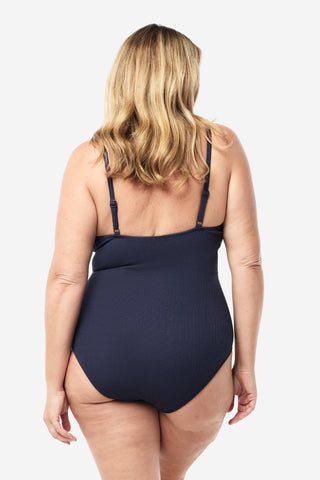 Model wears an XL. She is a size 16, wears a 16DD bra and 181cm tall.