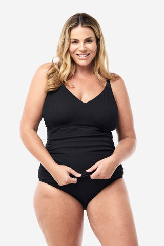 Model wears an XL. She is a size 16, wears a 16DD bra and 181cm tall.