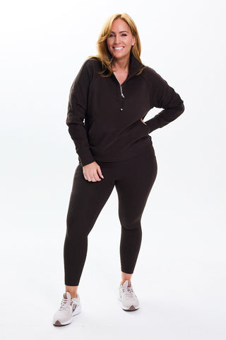 Models wears a size M. She is a size 14 and is 172cm tall.