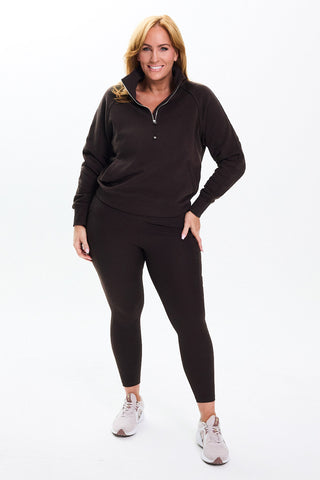 Models wears a size M. She is a size 14 and is 172cm tall.