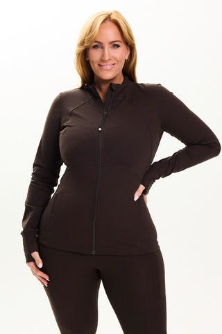 Models wears a size M. She is a size 14 and is 172cm tall.