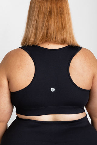 Model wears a 3XL. She is size 24, wears a 24DD bra and is 175 tall.