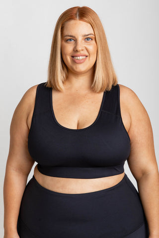 Model wears a 3XL. She is size 24, wears a 24DD bra and is 175 tall.