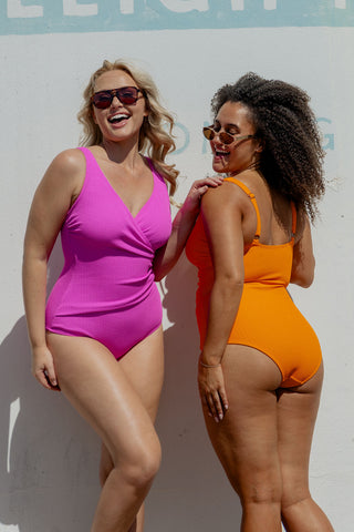 Burleigh Core Support One Piece Swim in Hot Pink Texture, front view on model beside a second model in back view
