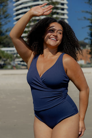 Burleigh Core Support One Piece Swim in Navy Texture, front view on model showing the V neck crossover front