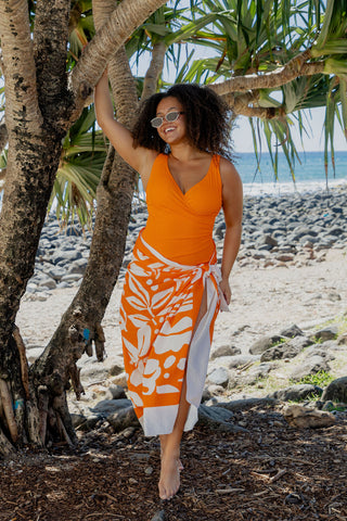 Burleigh Core Support One Piece Swim in Orange Pop Texture, front view on model styled with the matching Calypso Orange Pop sarong