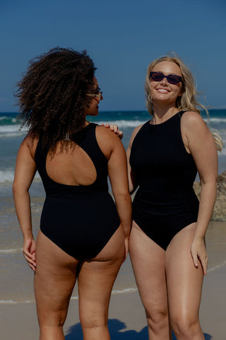 Coogee Core Support One Piece Swim in Black Texture, back view on model beside a second model in front view