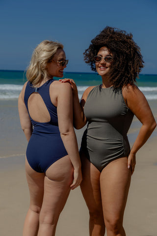 Coogee Core Support One Piece Swim in Navy Texture, back view on model showing the open back beside a second model