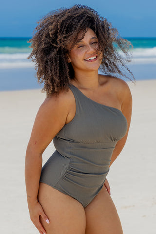 Esperance Core Support One Piece Swim in Khaki Texture, side view on model at the beach