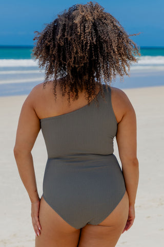Esperance Core Support One Piece Swim in Khaki Texture, back view on model at the beach
