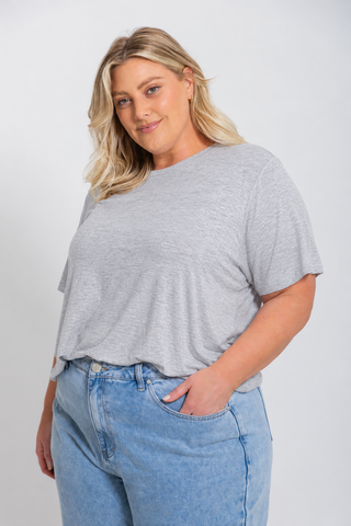 Classic Bamboo T-Shirt in Grey Marle, close up front view on model with hand in pocket, styled with denim jeans.