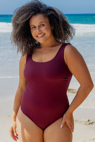 Sorrento Core Support One Piece Swim in Dark Cherry Texture, front view on model showing the scoop neckline and wide straps