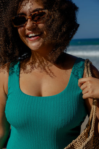 Sorrento Core Support One Piece Swim in Emerald Texture, close up of the scoop neckline and wide straps