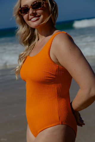 Sorrento Core Support One Piece Swim in Orange Pop Texture, side view close up of the bust support