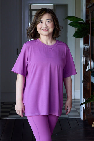 Christina wears a size M