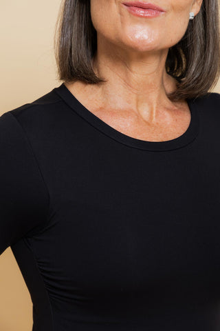 Sculpt Crew Neck Bodysuit in black, side view showing smoothing fit