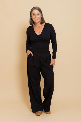 Sculpt V Neck Bodysuit in black worn with tailored pants